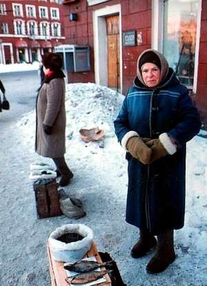 Old lady selling fish in -10 celcius weather
